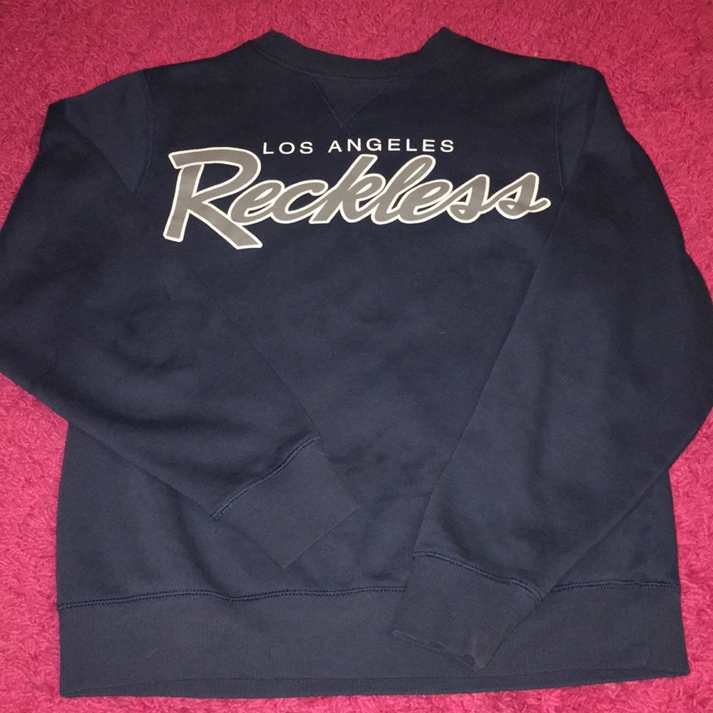 Young and reckless crew neck